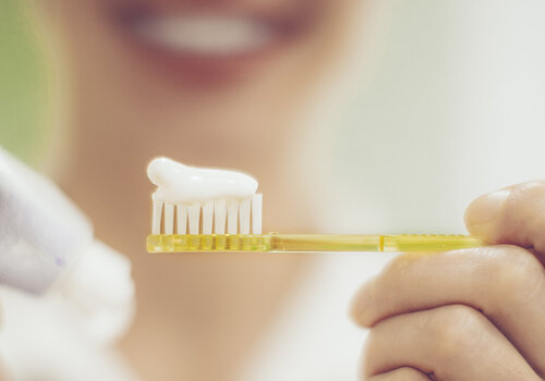 Dentist working in her office